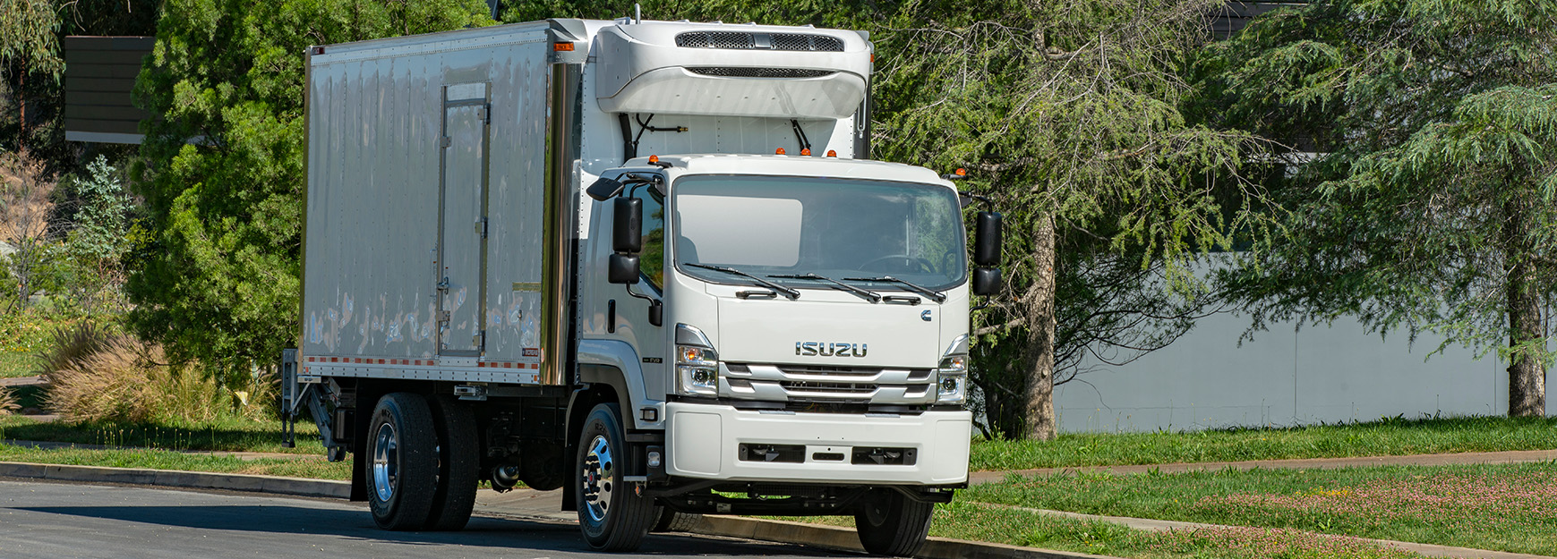 Isuzu Commercial Truck being used to make deliveries.