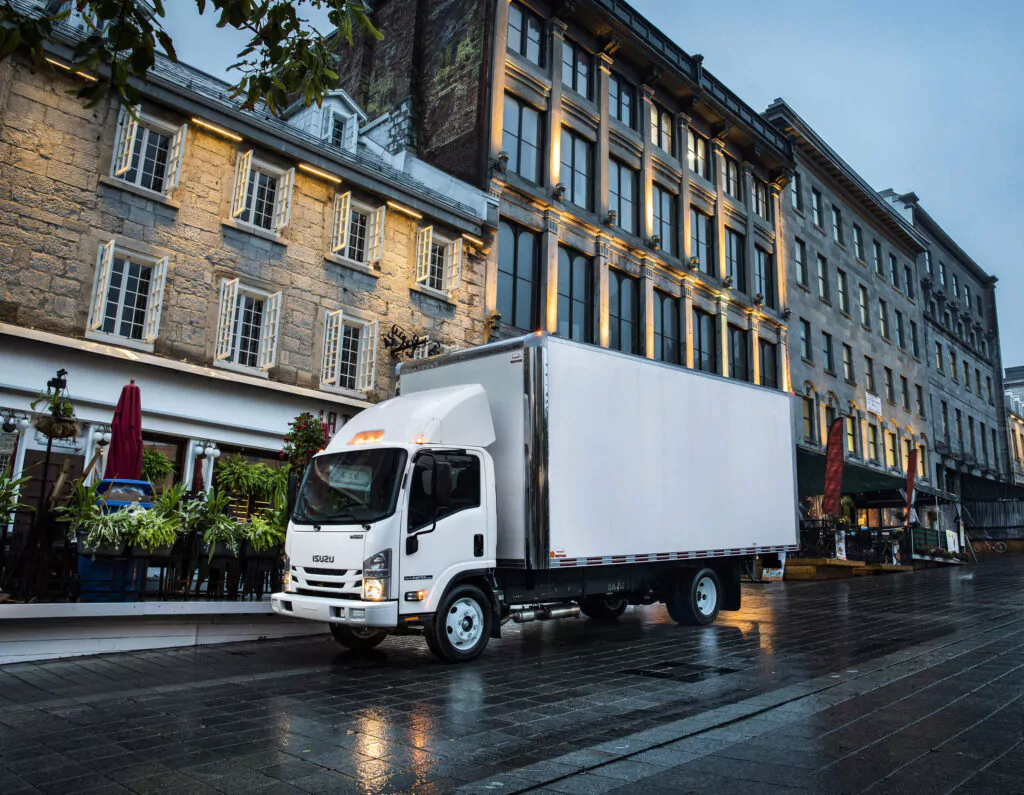 Isuzu on wet street